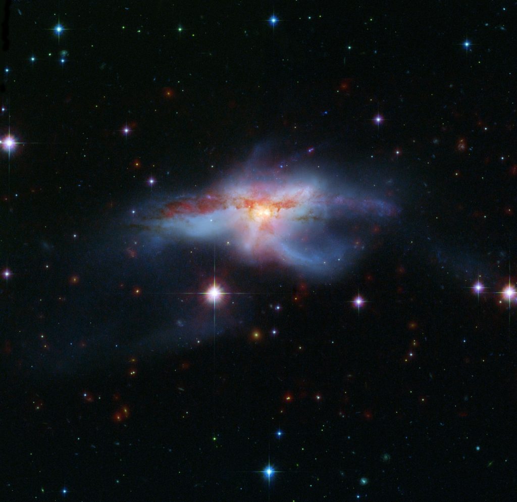 Three giant black holes at the center of one galaxy